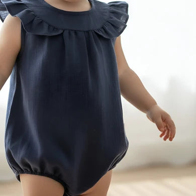 Baby navy linen bodysuit romper at Tajoh & GG