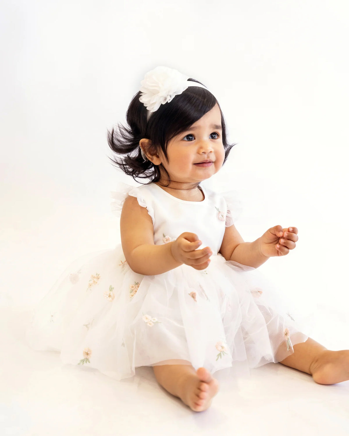 White baby baptism headband at Tajoh & GG