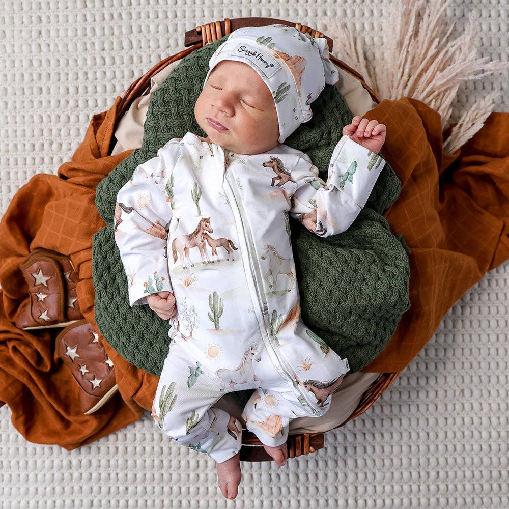 Baby onesie zipsuit with horses at Tajoh & GG